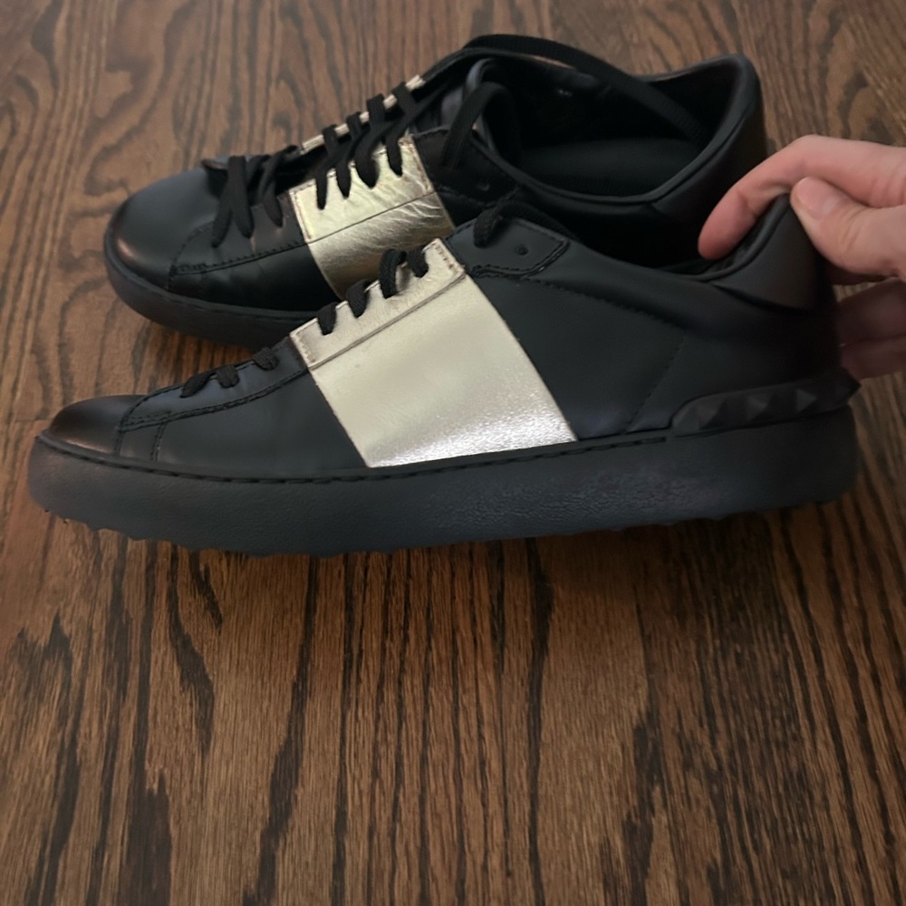 Valentino Garavani womens black/ gold low top sneakers, size 40 (U.S. 9.5)